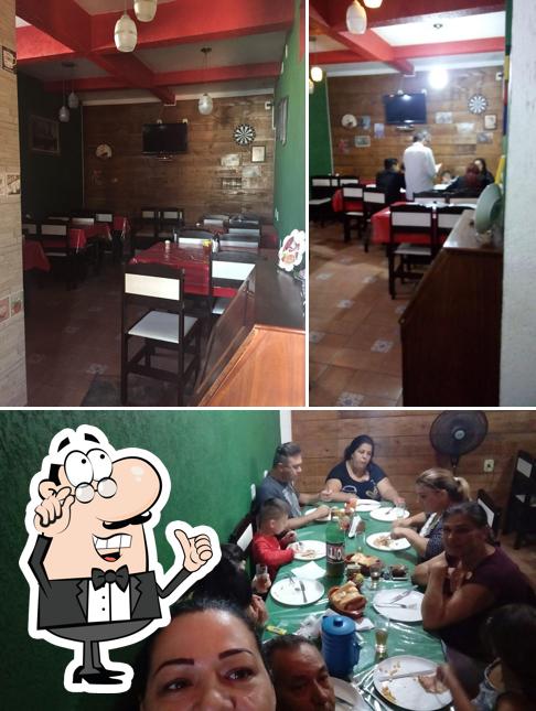 O interior do Pizzaria entre amigos