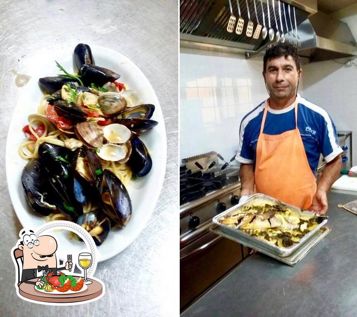 Ordina la cucina di mare a Calanca Beach