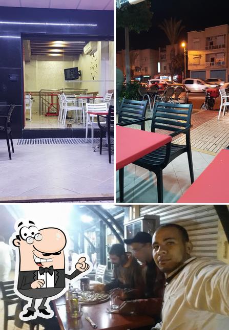 Voici l’image indiquant la intérieur et comptoir de bar sur Altero Pizza