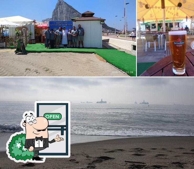 Observa las fotos que muestran exterior y cerveza en Chiringuito Santa Bárbara Beach