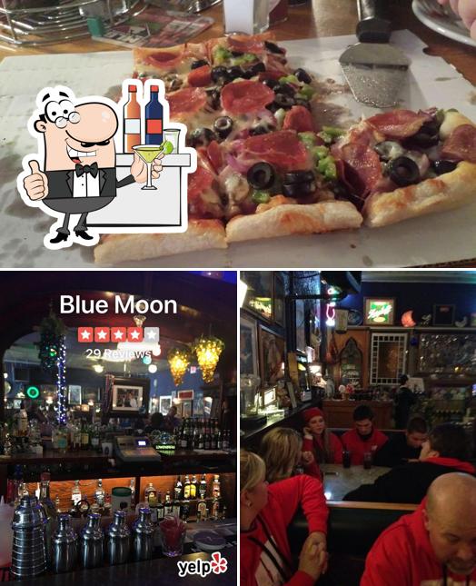 This is the picture showing bar counter and pizza at Blue Moon