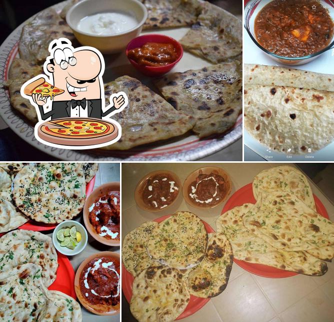 Get pizza at Rasoi Punjab Di