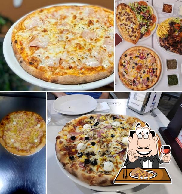 Try out pizza at D2 Bar - Restaurante