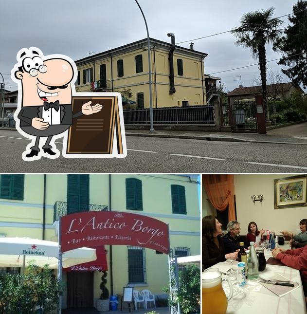 La esterno e tavolo da pranzo del ristorante