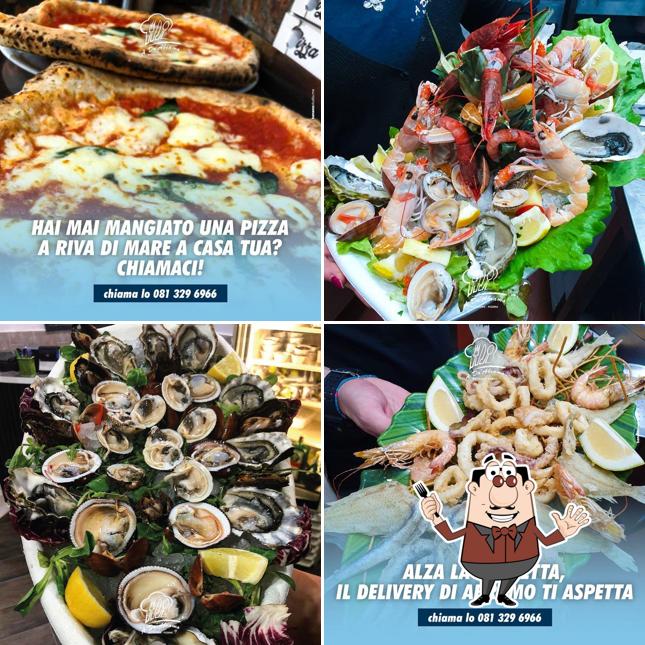 Sashimi, ostriche e calamari fritti al A do abramo ristorante e pizzeria-official