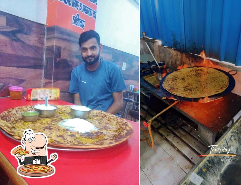 Try out pizza at Sitara Sweets & Parantha Junction