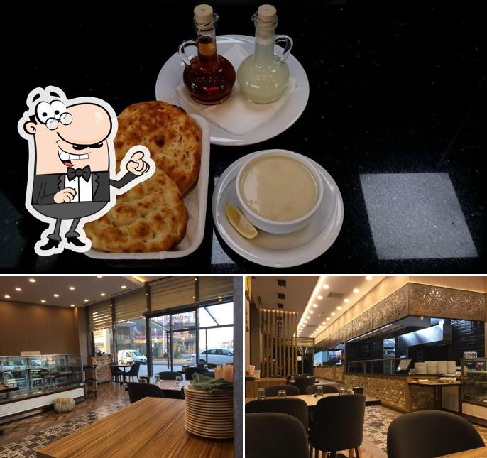 The picture of interior and pizza at ADEN RESTAURANT