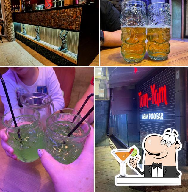 Take a look at the picture showing drink and interior at Tom -Yam