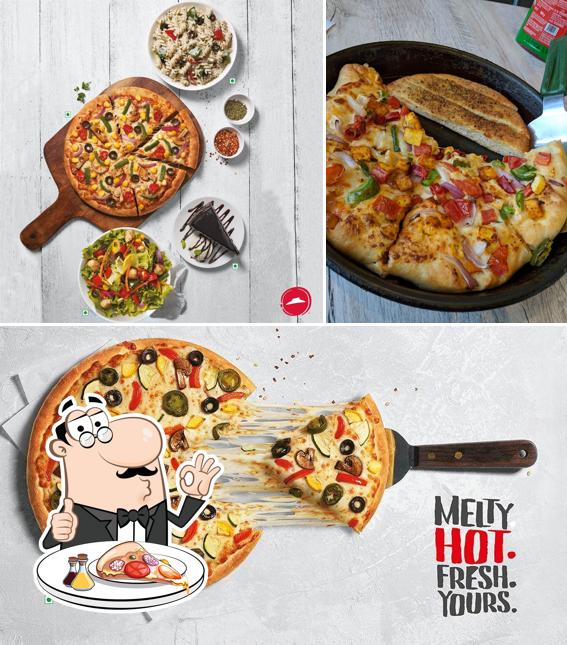 Pick pizza at Pizza Hut Piyush Mall, Faridabad