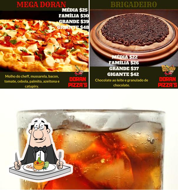 Entre diversos coisas, comida e bebida podem ser encontrados no Doran Pizzas