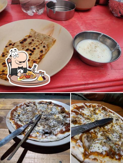 Try out pizza at Reverberate Cafe & Cottages
