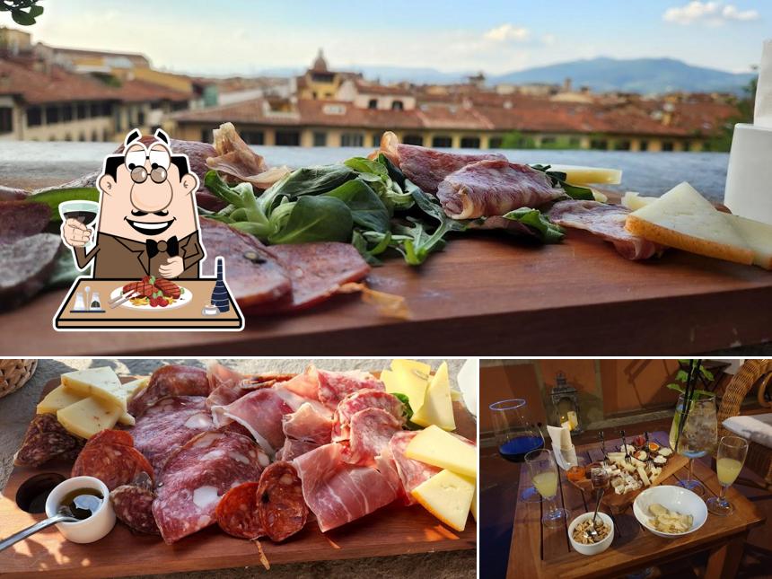 Ordina i piatti di carne a Loggia Roof Bar