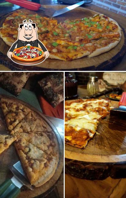 Try out pizza at The Walled City - Café & Lounge