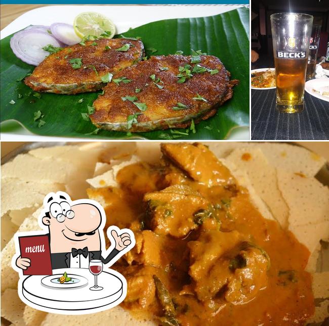 Among various things one can find food and beer at Vinamra Bar & Restaurant