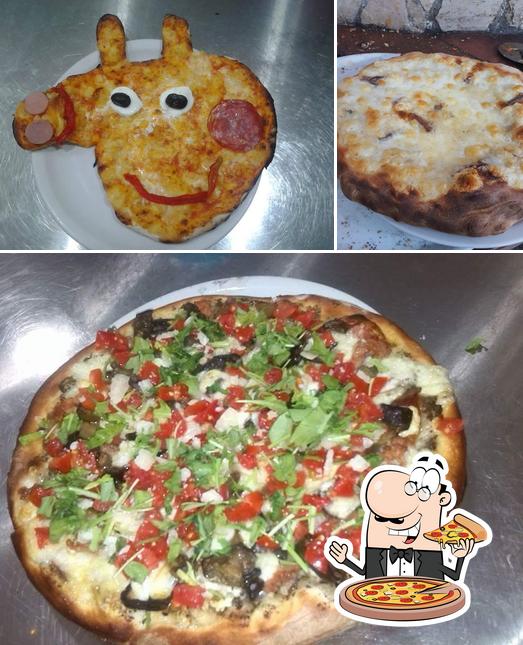 A Pizzeria La Capannina Di Puglia Giuseppina, vous pouvez prendre des pizzas