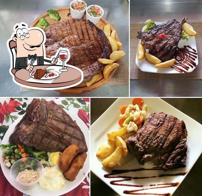 Peça refeições de carne no Restaurante Paulino