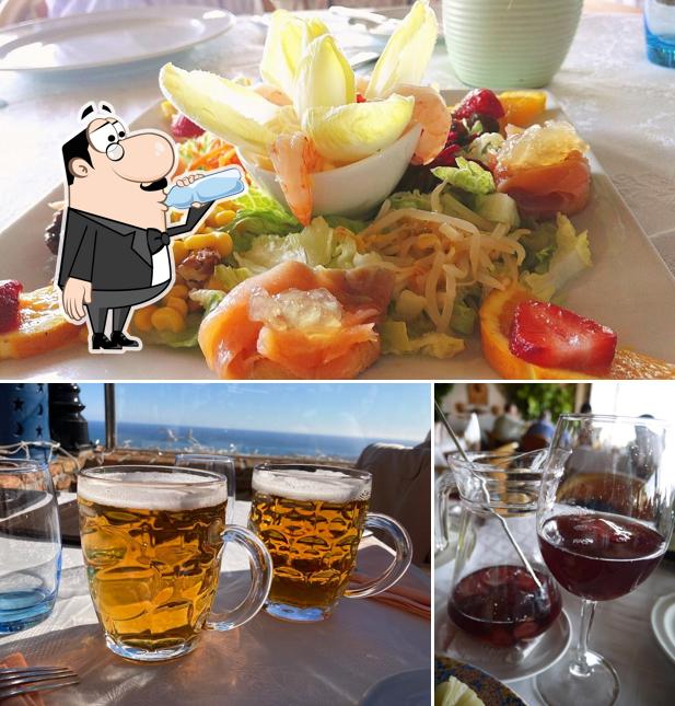 Among various things one can find drink and food at Restaurante La Alcazaba De Mijas