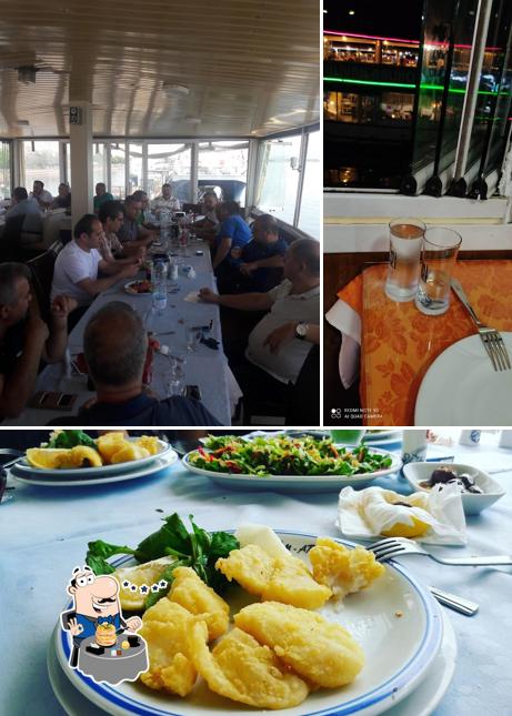 Взгляните на этот снимок, где видны еда и пиво в Kıyıcı Tekneler