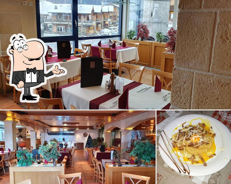 Jetez un coup d’oeil à la photo affichant la intérieur et nourriture concernant Restaurant-Pizzeria Mont Calme