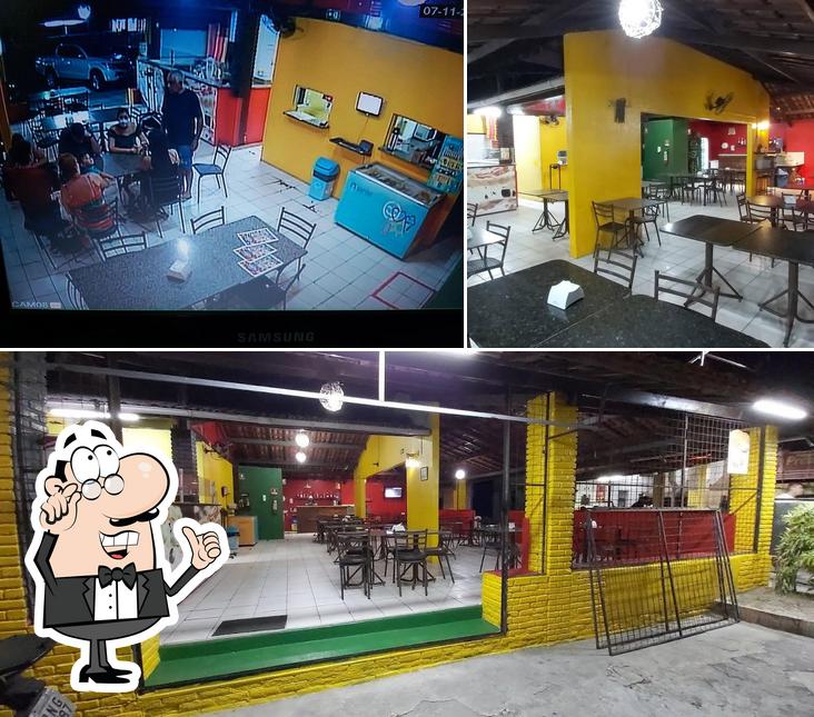 O interior do Pizzaria Casa da Itália