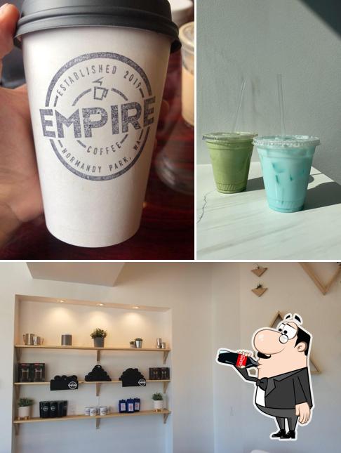 Take a look at the photo showing drink and interior at Empire Coffee