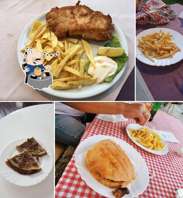 Spezzatino di maiale e patatine fritte al Fast Food Slavuj