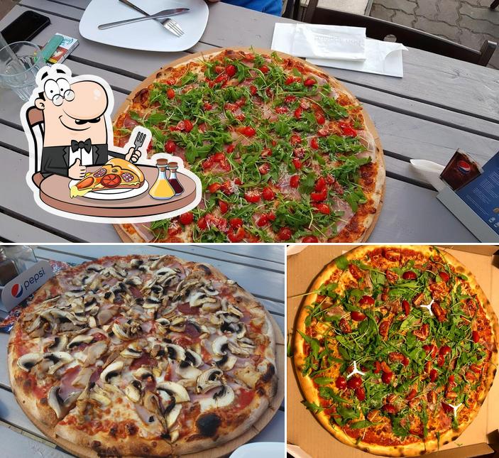 Get pizza at Grande Tomato