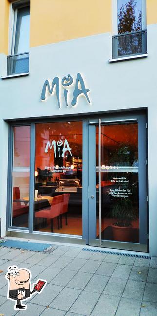 Look at the photo of Café Mia