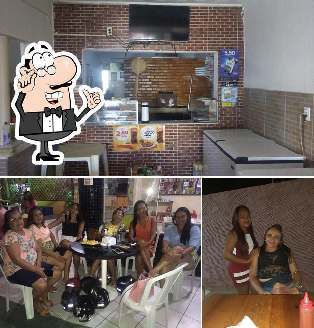 Entre diferentes coisas, interior e comida podem ser encontrados a Pizzaria e Restaurante A Gruta