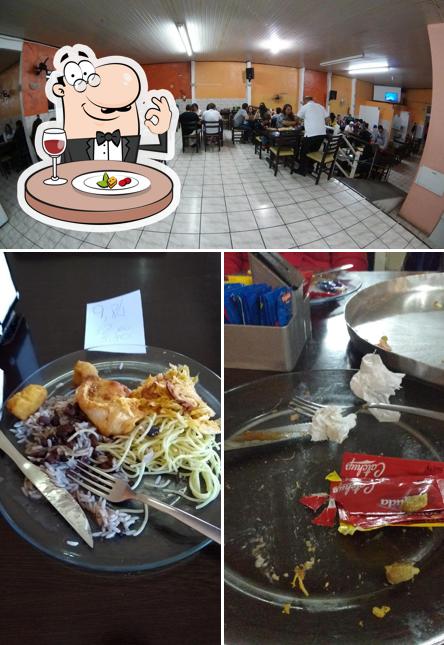 O Restaurante & Pizzaria Brasileirissimo se destaca pelo comida e interior