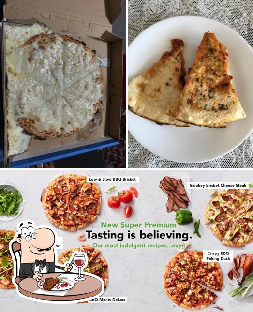 Try out meat dishes at Domino's Pizza Strathfield