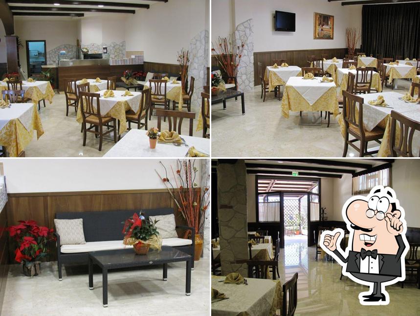 Découvrez l'intérieur de Ristorante Golden City Pizzeria Affittacamere