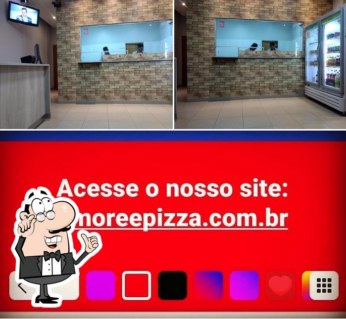 O interior do Pizzaria Amore & Pizza