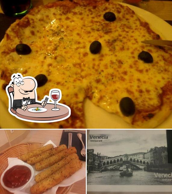 Estas son las imágenes donde puedes ver comida y exterior en Pizzeria Venecia