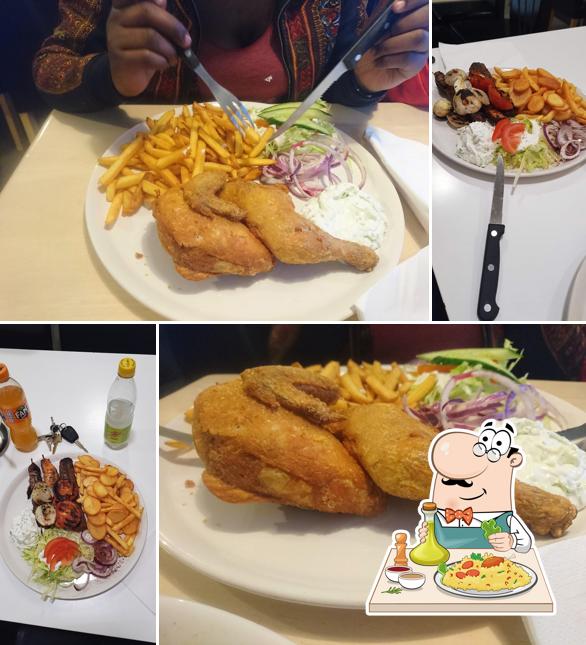 Pescado y patatas fritas en Younes Grill & Pizza