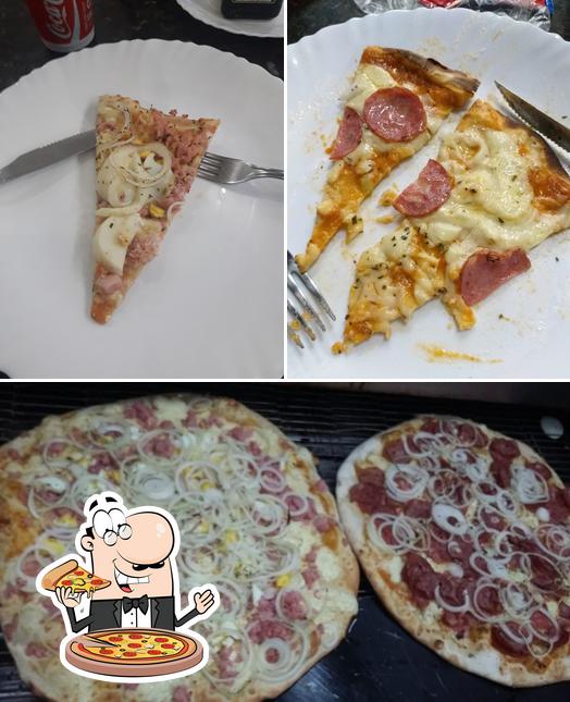 Escolha pizza no Restaurante e Pizzaria Arena's