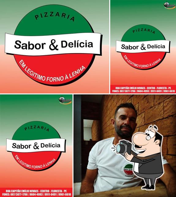 Here's an image of Pizzaria sabor e delícia