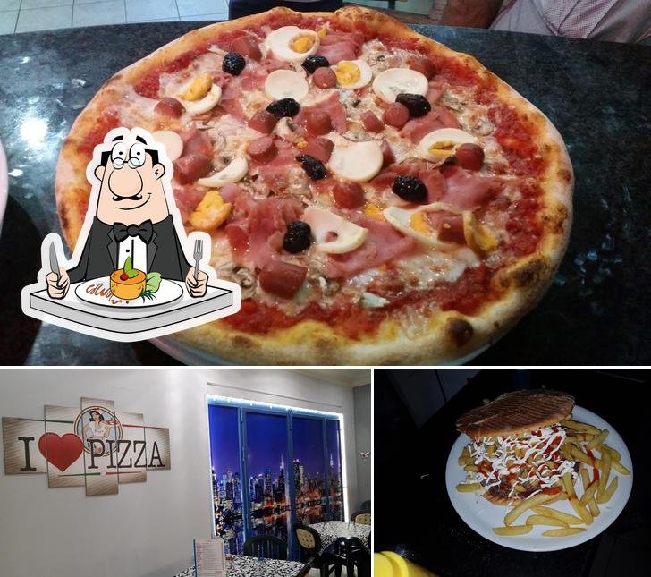 Tra le diverse cose da Pizzeria Gusto Più si possono trovare la cibo e interni