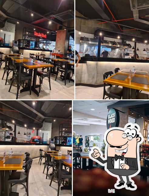 O interior do Restaurante Black Wood Shopping Piratas Angra dos Reis RJ