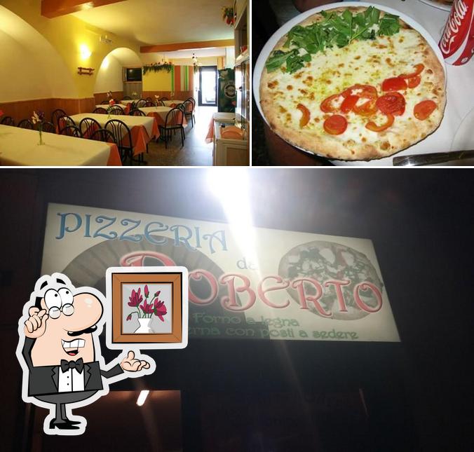 Tra le diverse cose da Pizzeria da Roberto si possono trovare la interni e pizza