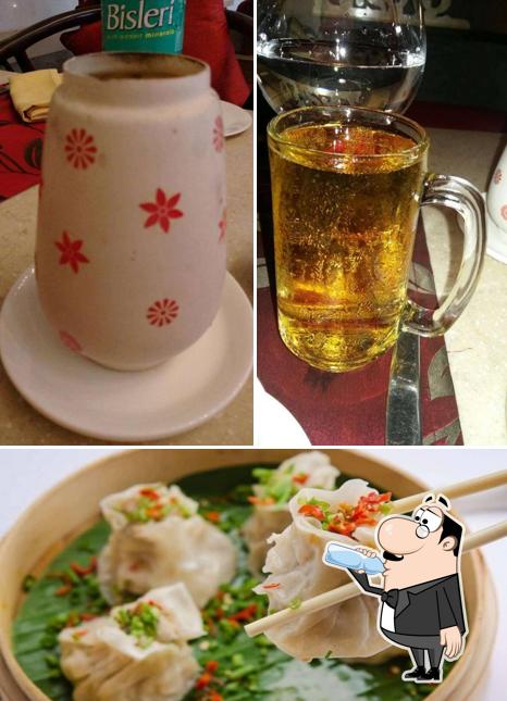 This is the photo depicting drink and food at Nyon Yang