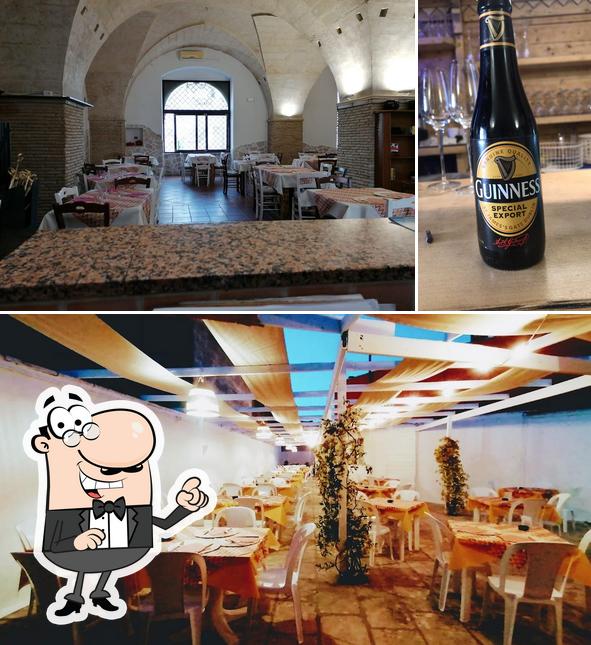 La immagine di interni e birra da Ristorante Papale Papale Cucina tipica salentina