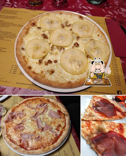 A Ristorante Pizzeria - La Tana, puoi provare una bella pizza