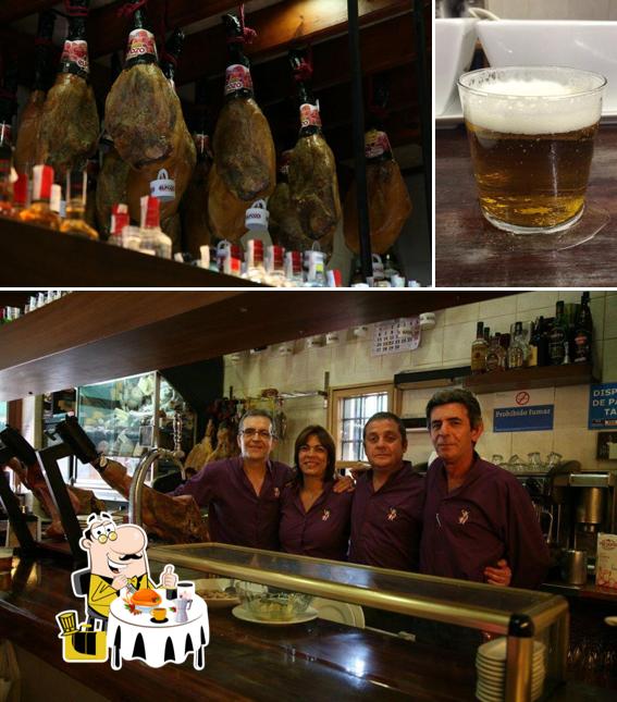 Check out the picture showing food and beer at Mesón Don Jamón