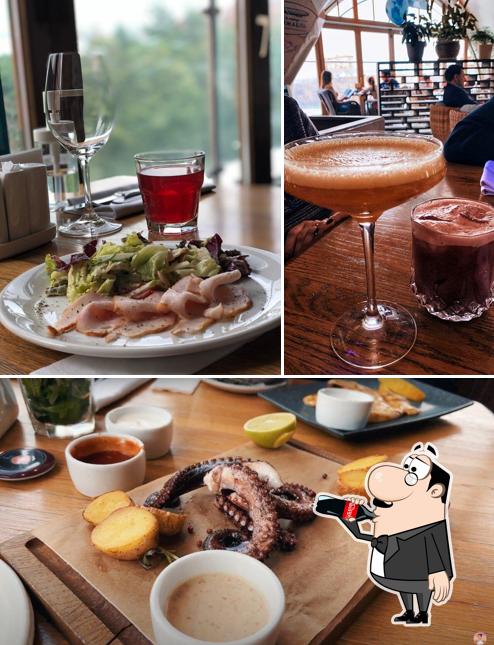 Фотография, на которой видны напитки и еда в Дирижабль