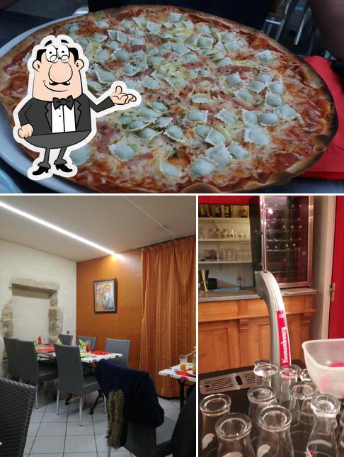 L’image de la intérieur et pizza de La comedia’s