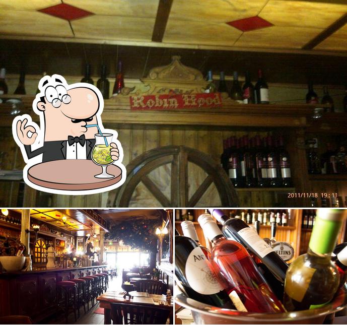 Это фото, где изображены напитки и барная стойка в Bistro Café Robin Hood