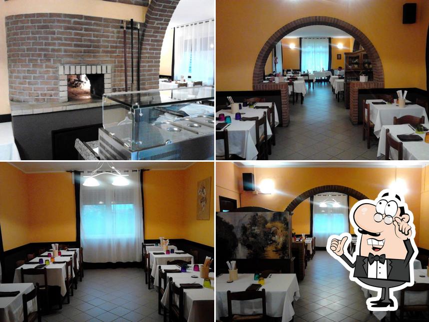 Dai un'occhiata agli interni di La Magnolia Ristorante-Pizzeria-Bar di Valeria e Gina Saba