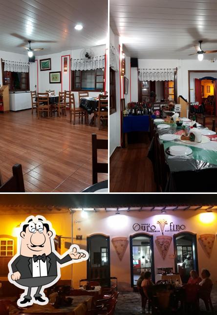 Sente em uma das mesas no Espaço Ouro Fino Pizaria e Restaurante