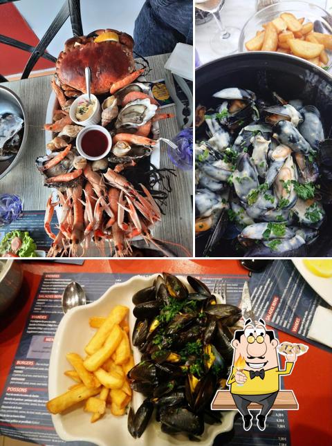 Order different seafood items served at Le Voilier